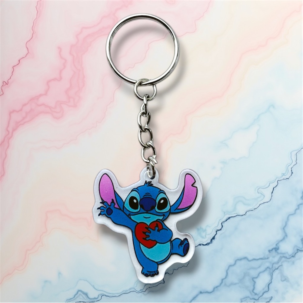 Stitch holding a heart keychain